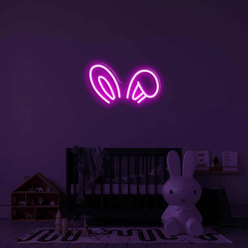 Logo al neon 3D luminoso su una parete - orecchie da coniglio